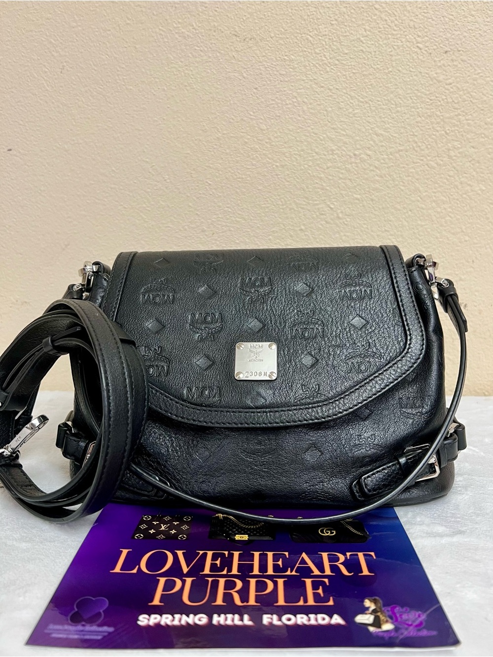 MCM Black Embossed Leather Crossbody Bag with Silver Plate